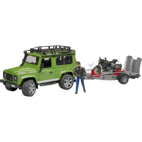 Land Rover Defender Station Wagon with Trailer, Ducati Scrambler Cafe Racer and Rider