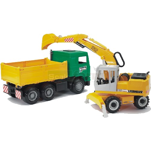 Construction truck and Liebherr 912 Excavator